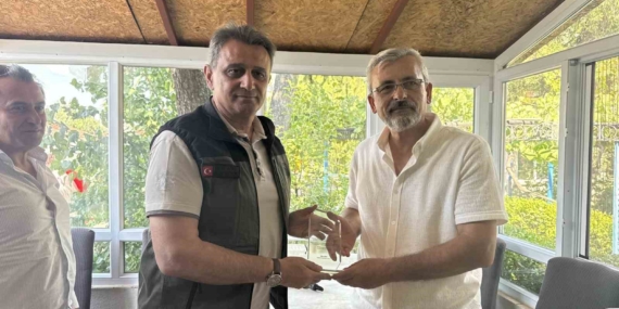 Kızılinler yangın timine teşekkür plaketi
